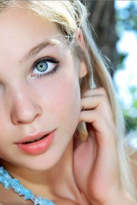 Gorgeous blonde teen with blue eyes